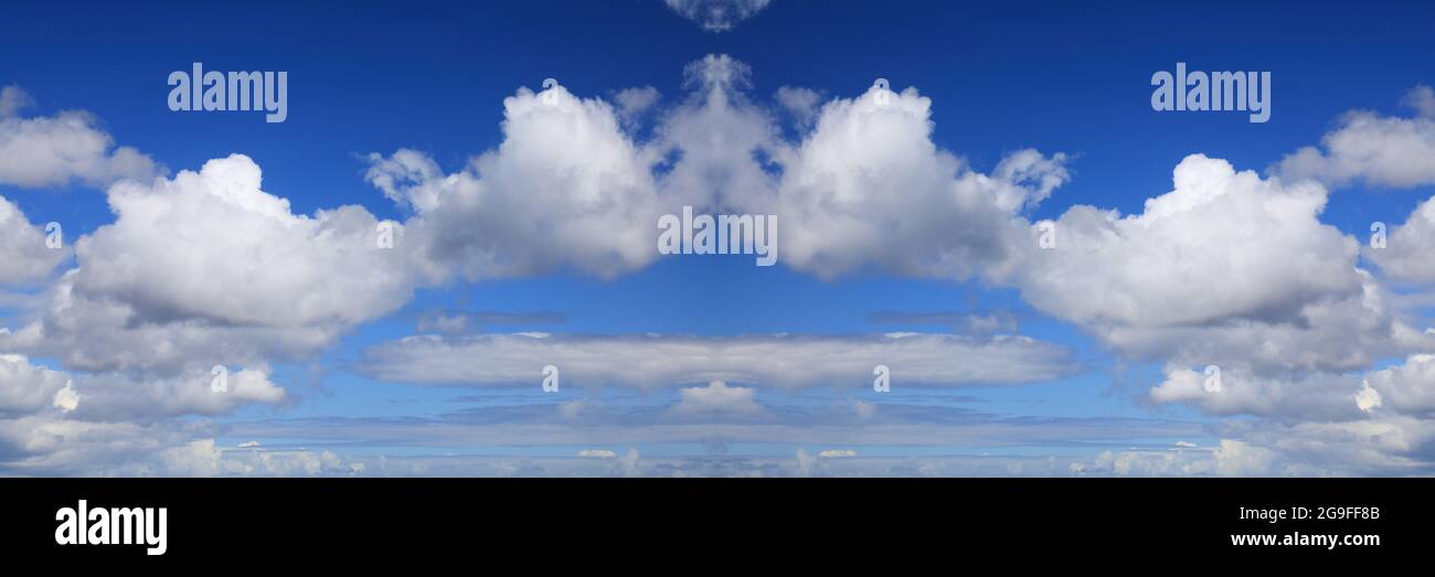 Panoramic sky background. White clouds blue sky background. White cumulus clouds texture. Stock Photo