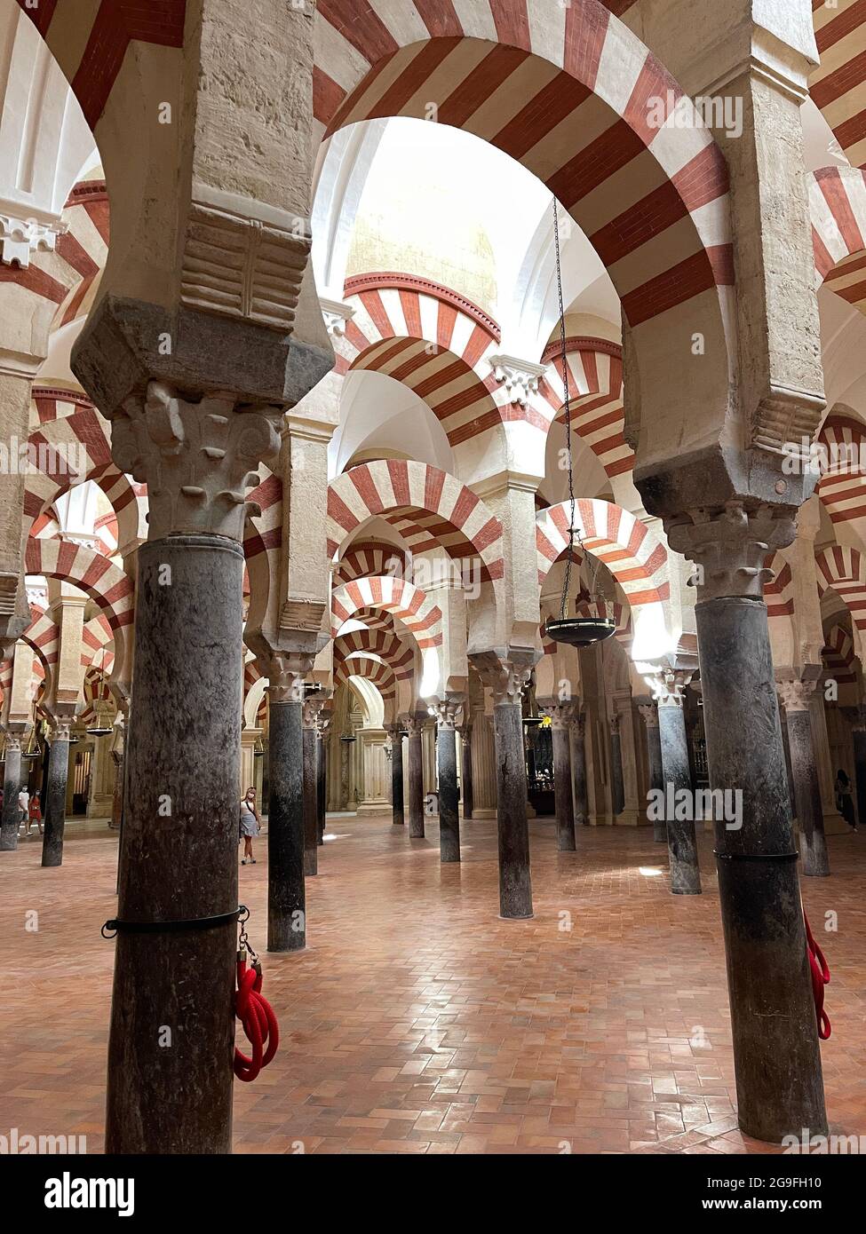 Arches and columns of the Cordoba mosque Stock Photo
