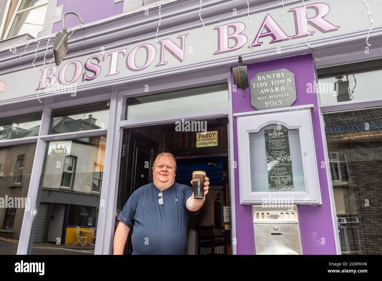 Bantry, West Cork, Ireland. 26th July, 2021. Today the so called 'wet pubs' reopened for the first time since the start of the pandemic. Pictured is Boston Bar owner, Danny Collins, brother of independent TD Michael Collins, who reopened his pub at 10.30 this morning. Credit: AG News/Alamy Live News Stock Photo