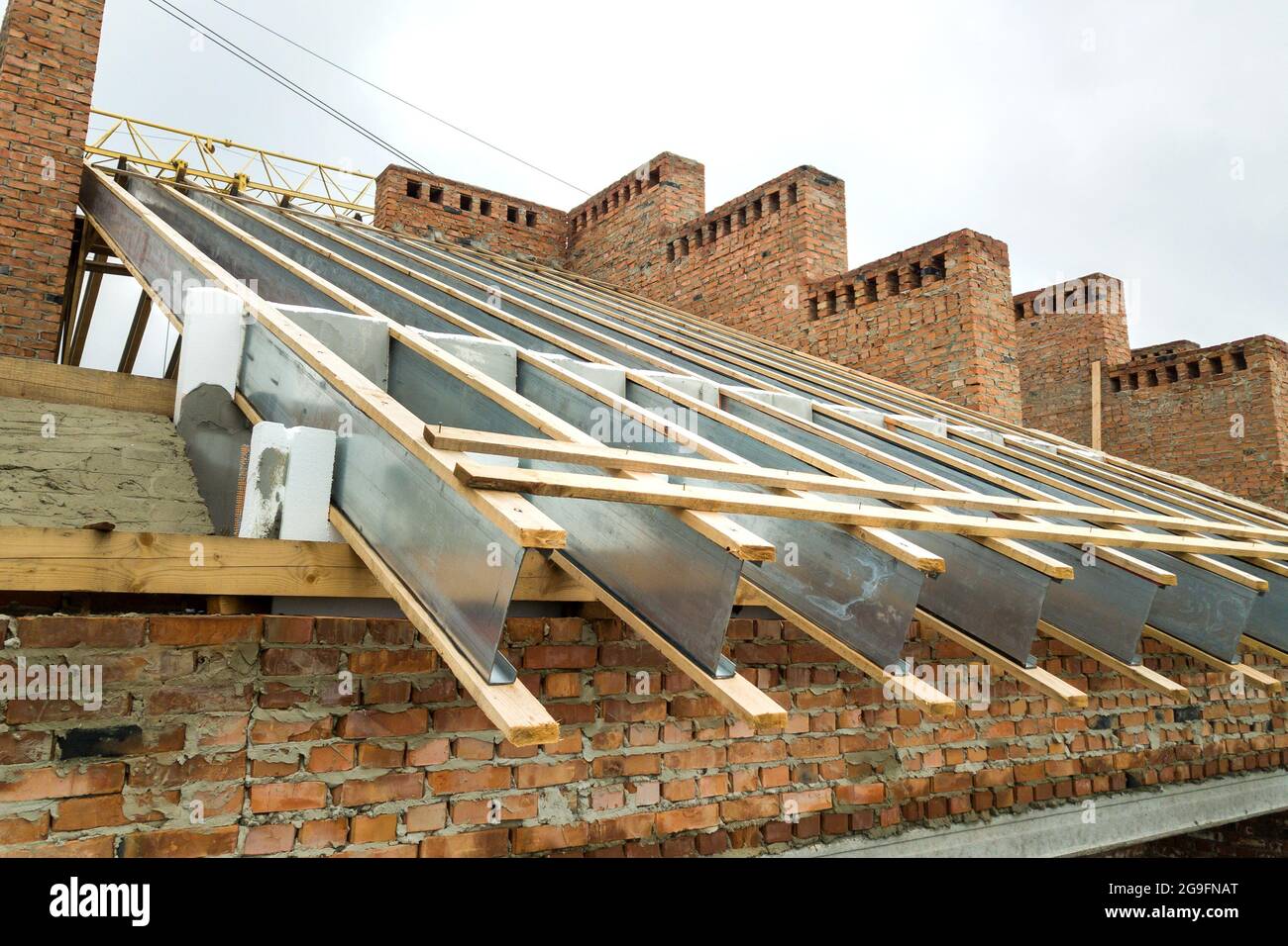 Attic brick chimney under construction hi-res stock photography and ...