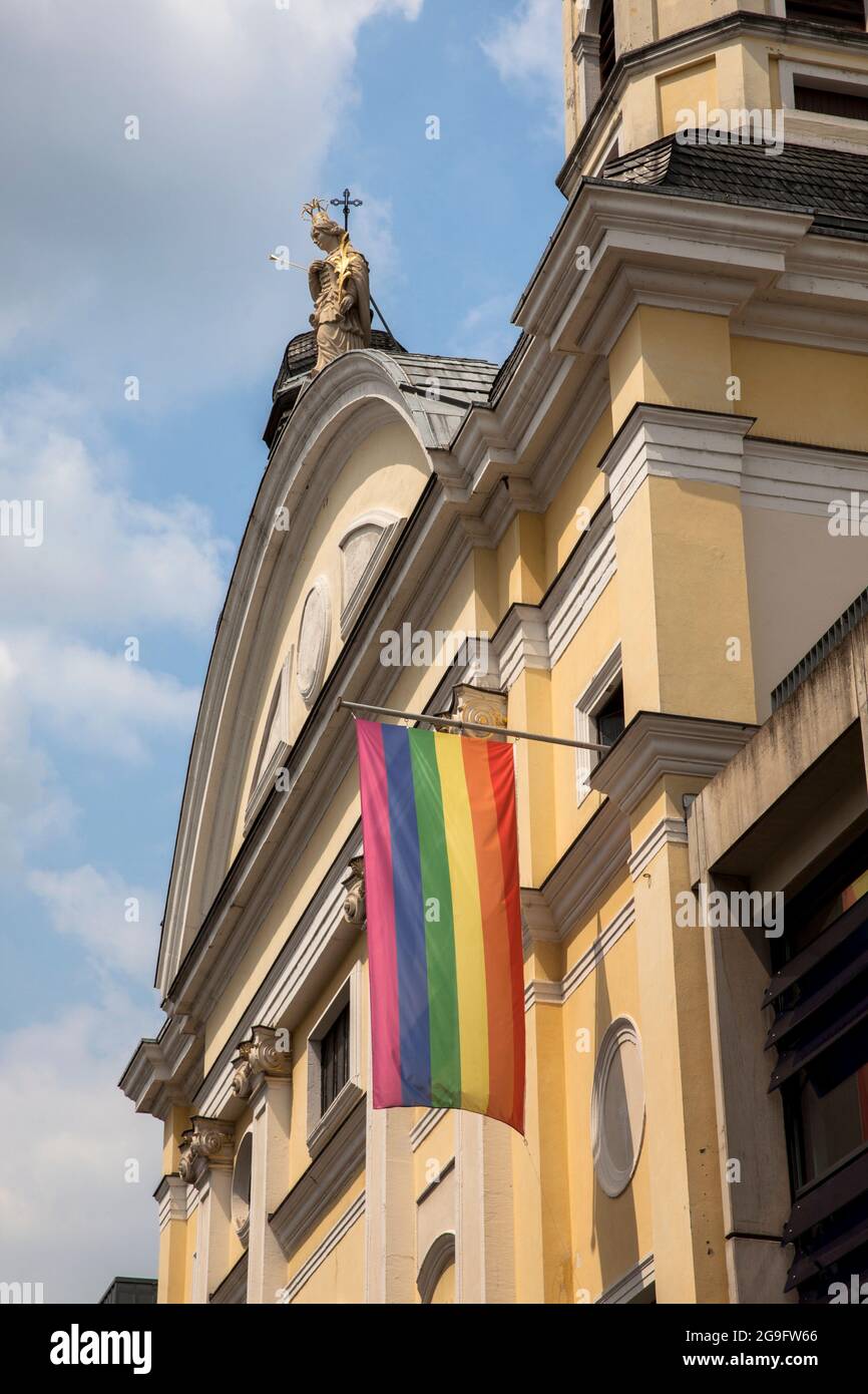 rainbow flag at the Ursulinen church Sankt Corpus Christi on the Machabaeerstreet, Cologne, Germany.  Regenbogenfahne an der Ursulinenkirche Sankt Cor Stock Photo