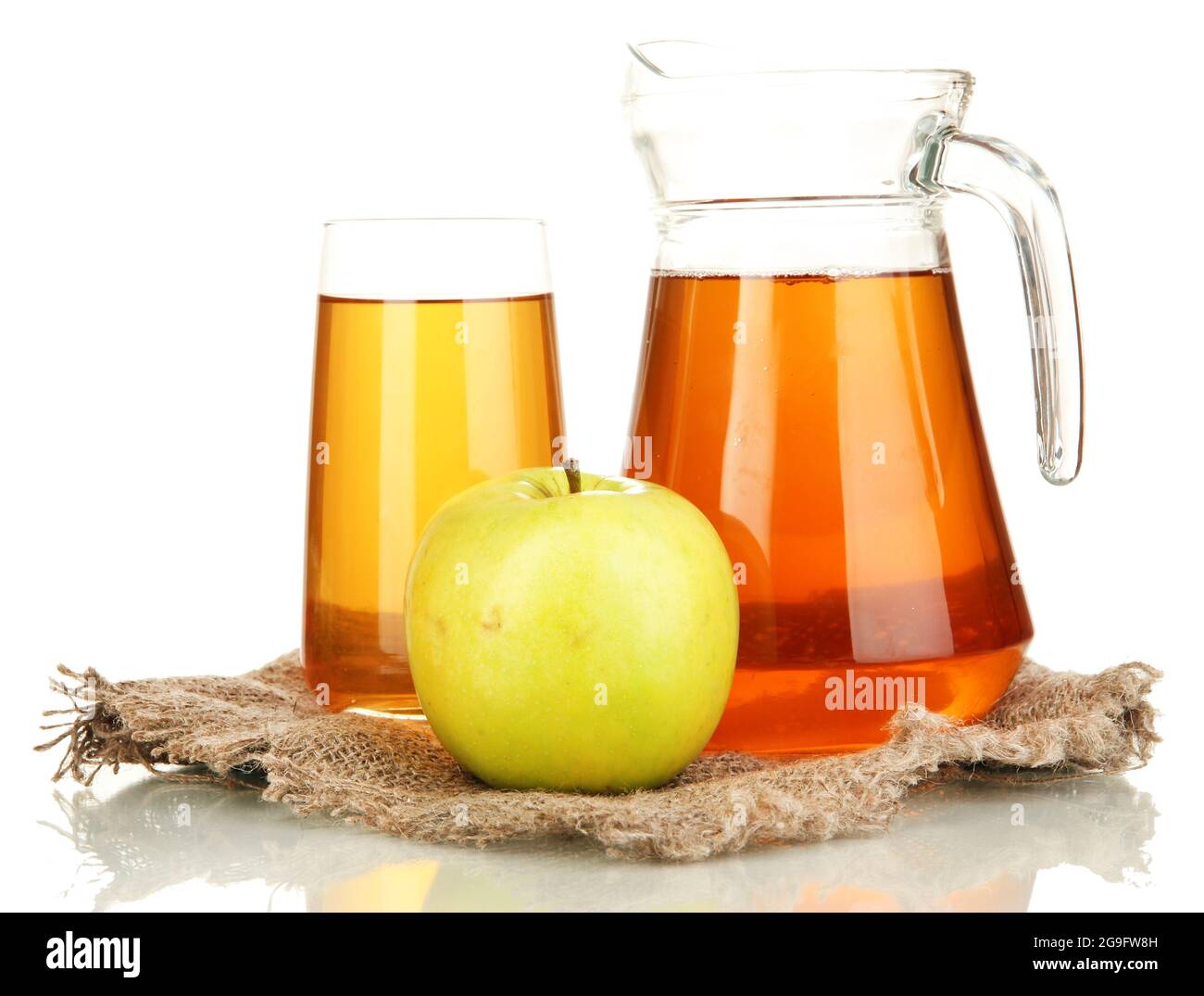 Full glass and jug of apple juice and apple isolted on white Stock ...