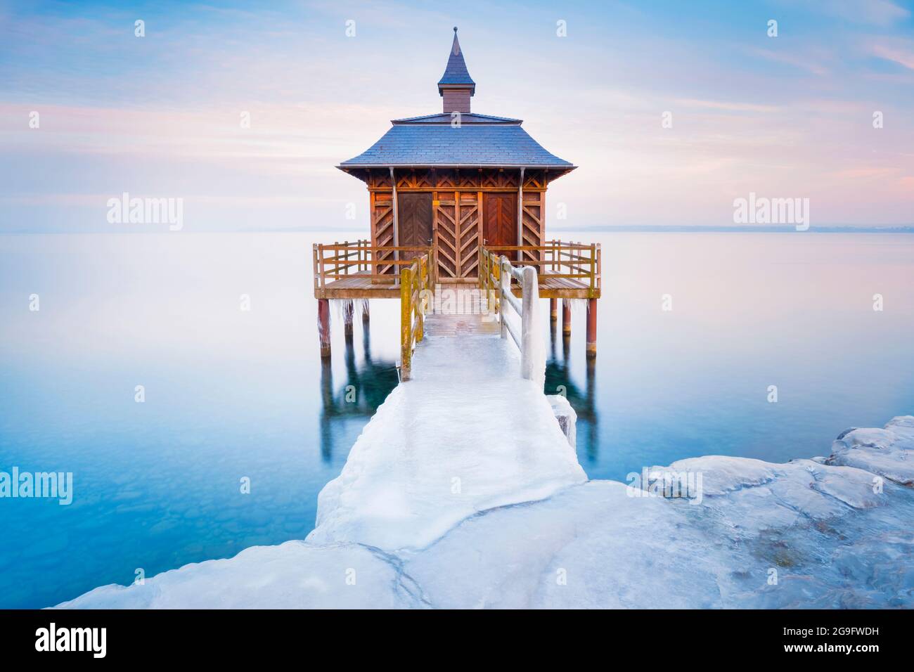 Icy Wooden Bath House In Evening Light On Lake Neuchatel In Gorgier icy-wooden-bath-house-in-evening-light-on-lake-neuchatel-in-gorgier