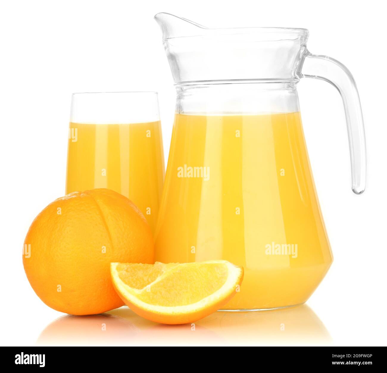 Full glass and jug of orange juice and oranges isolated on white Stock