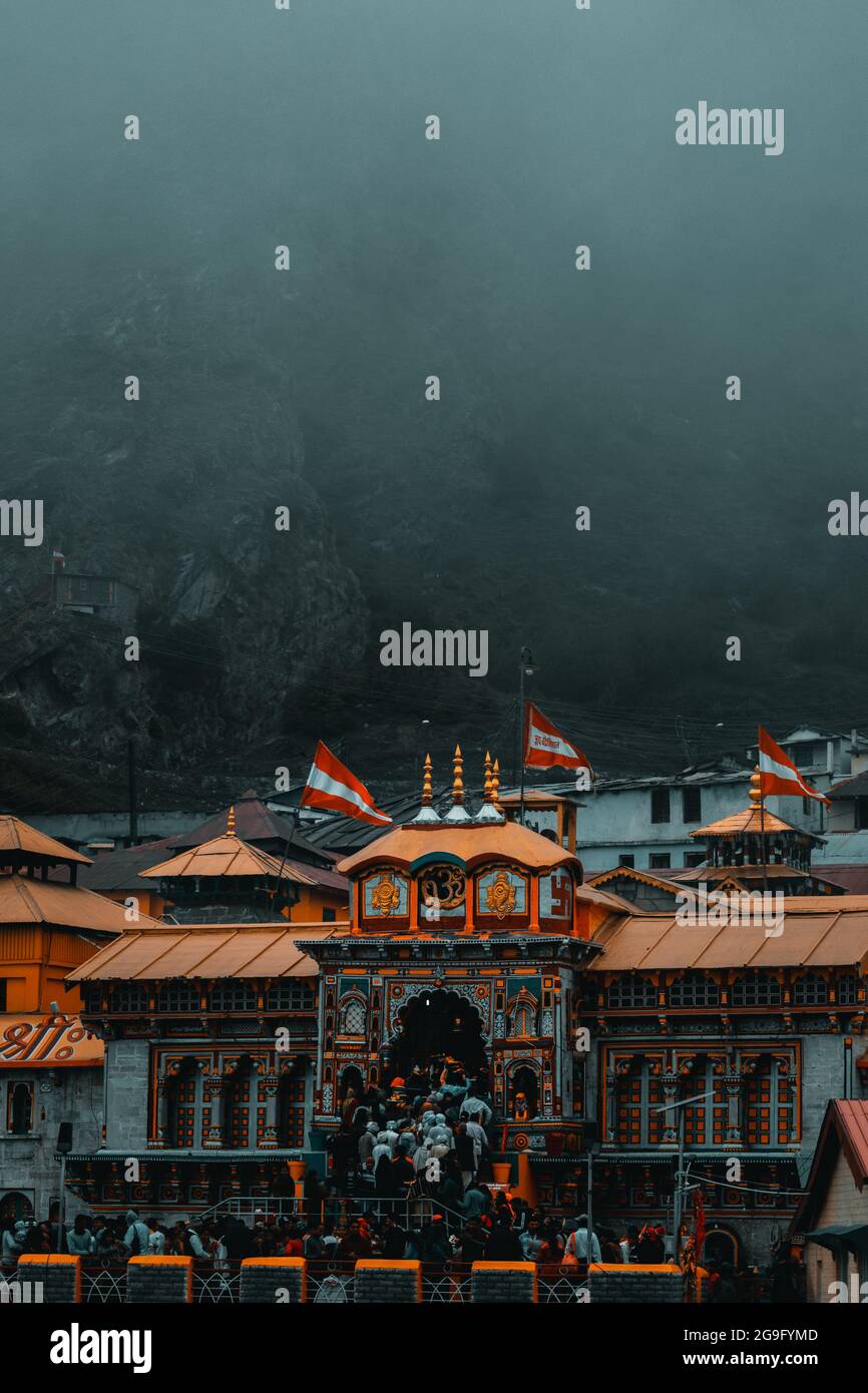 Moody photograph of Badrinath temple in Uttarakhand during monsoon season Stock Photo
