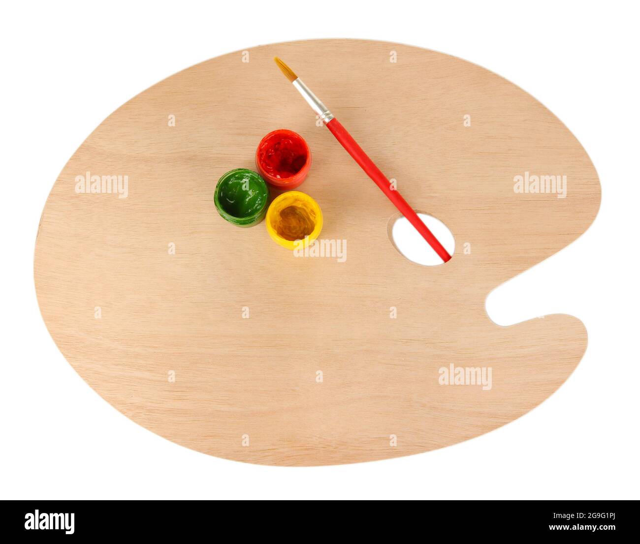 Wooden art palette with brush for painting and paints isolated on white ...