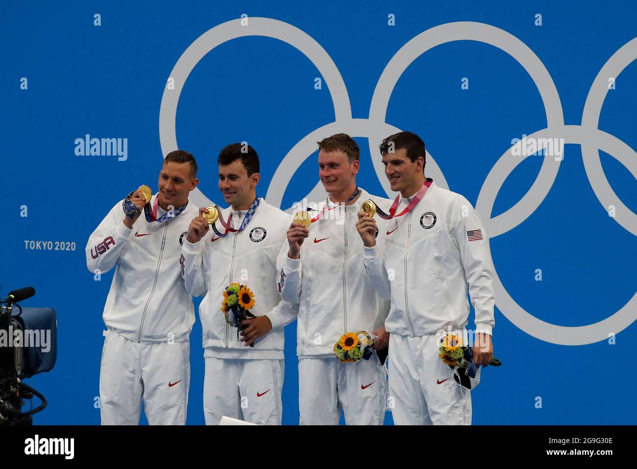 Tokyo, Japan. 26th July, 2021. Gold medal relay team of Caeleb Dressel ...
