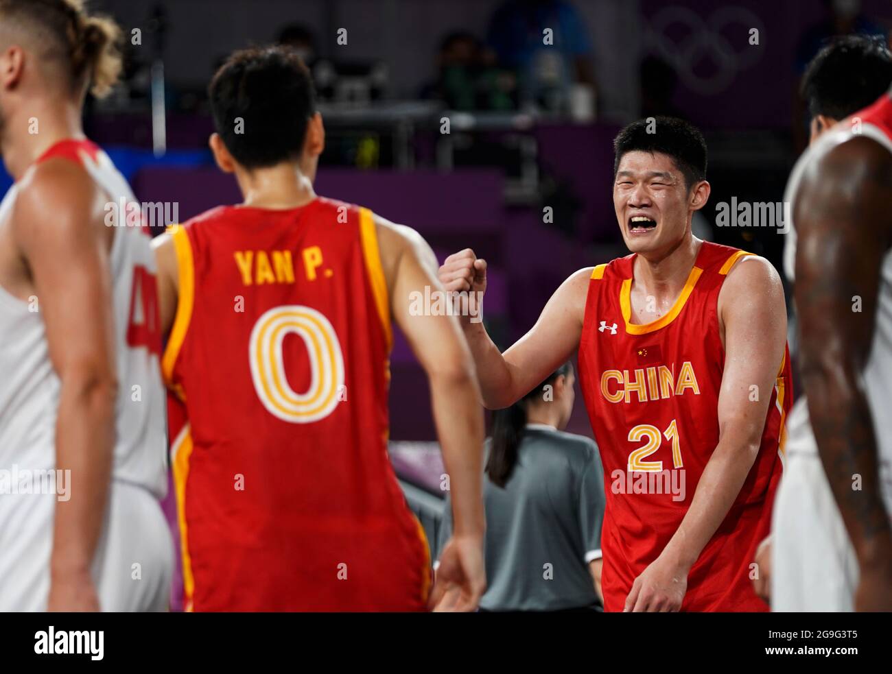 Tokyo, Japan. 26th July, 2021. China's Hu Jinqiu (R) celebrates with