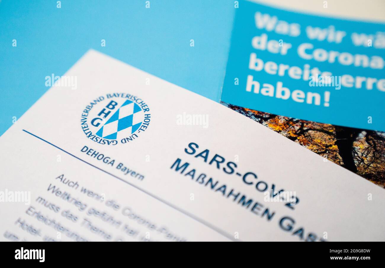 26 July 2021, Bavaria, Bamberg: A paper labeled 'SARS-CoV-2 Measures Hospitality Industry' taken at Bavarian Hospitality Day 2021. Photo: Nicolas Armer/dpa Stock Photo