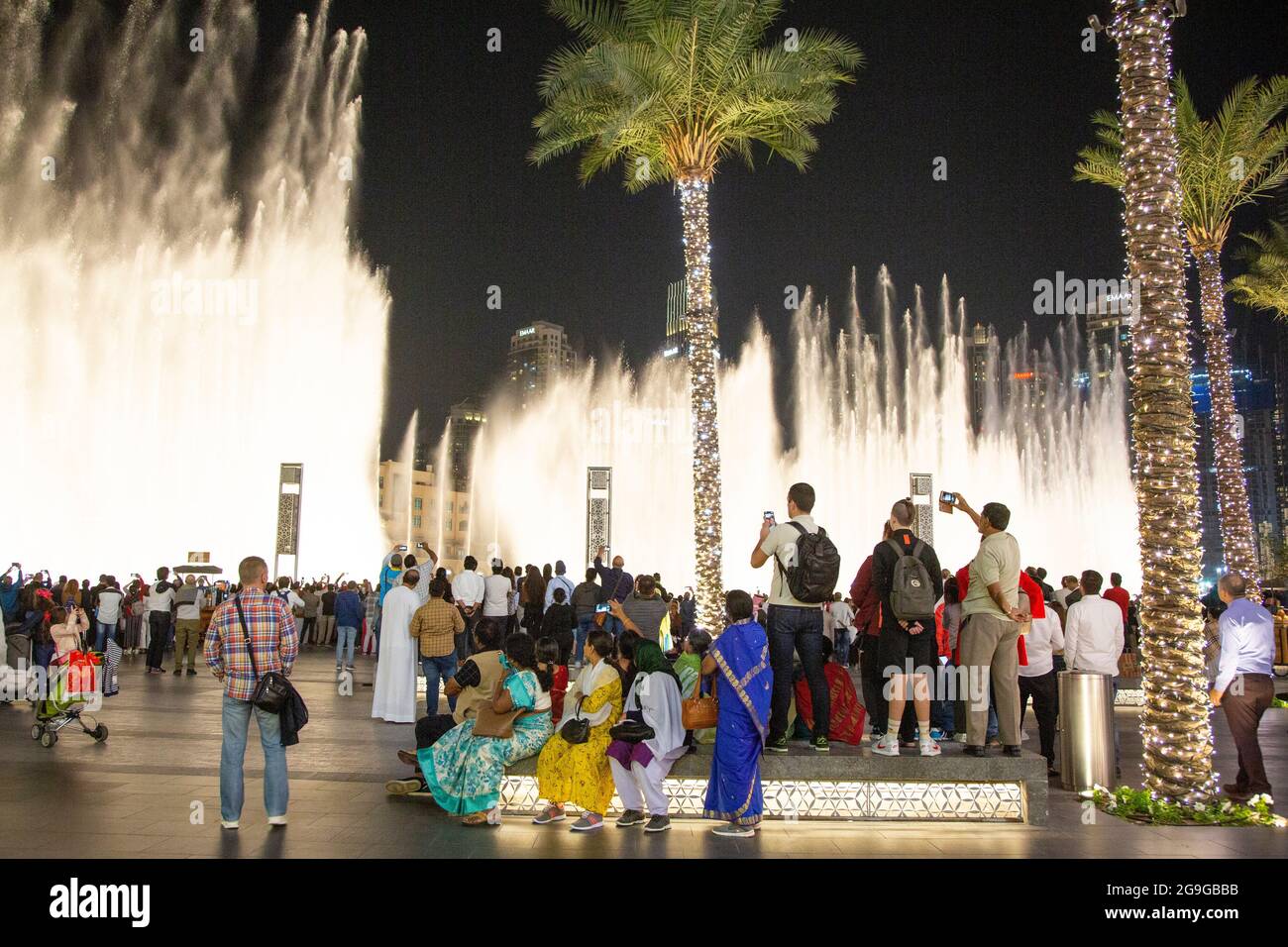 Visitors recording the dancing fountains in Dubai Mall on their phones