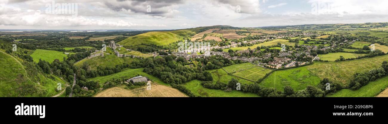 Aerial view of the Purbeck Hills around Corfe Castle, an historic ruins near Swanage in Dorsets Jurassic Coast- UK Stock Photo