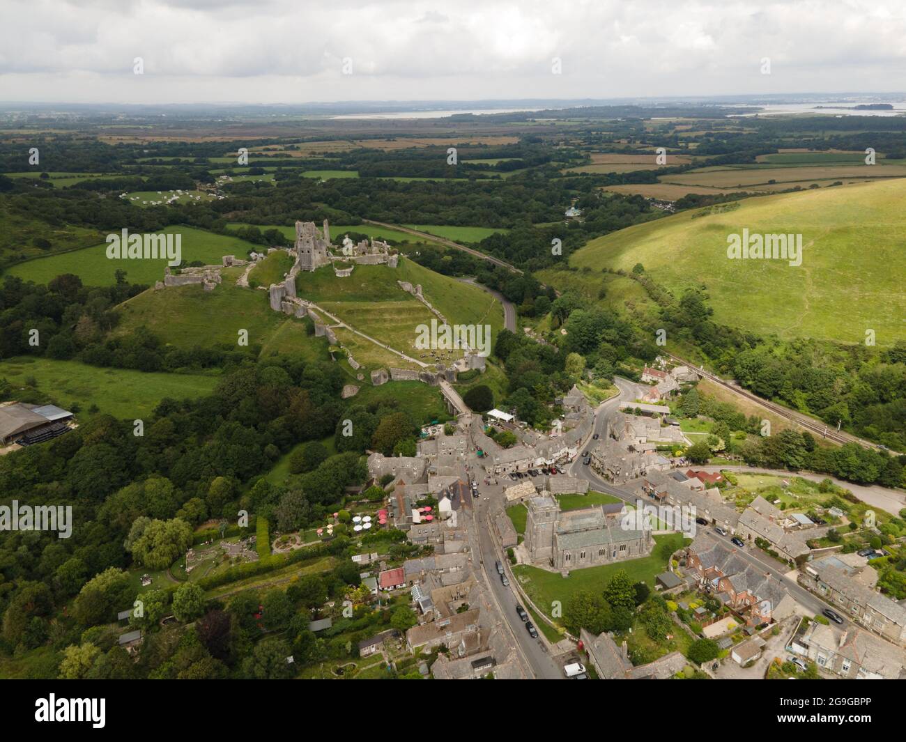 Aerial view of Corfe Castle, an historic ruins near Swanage in Dorsets Jurassic Coast- UK Stock Photo