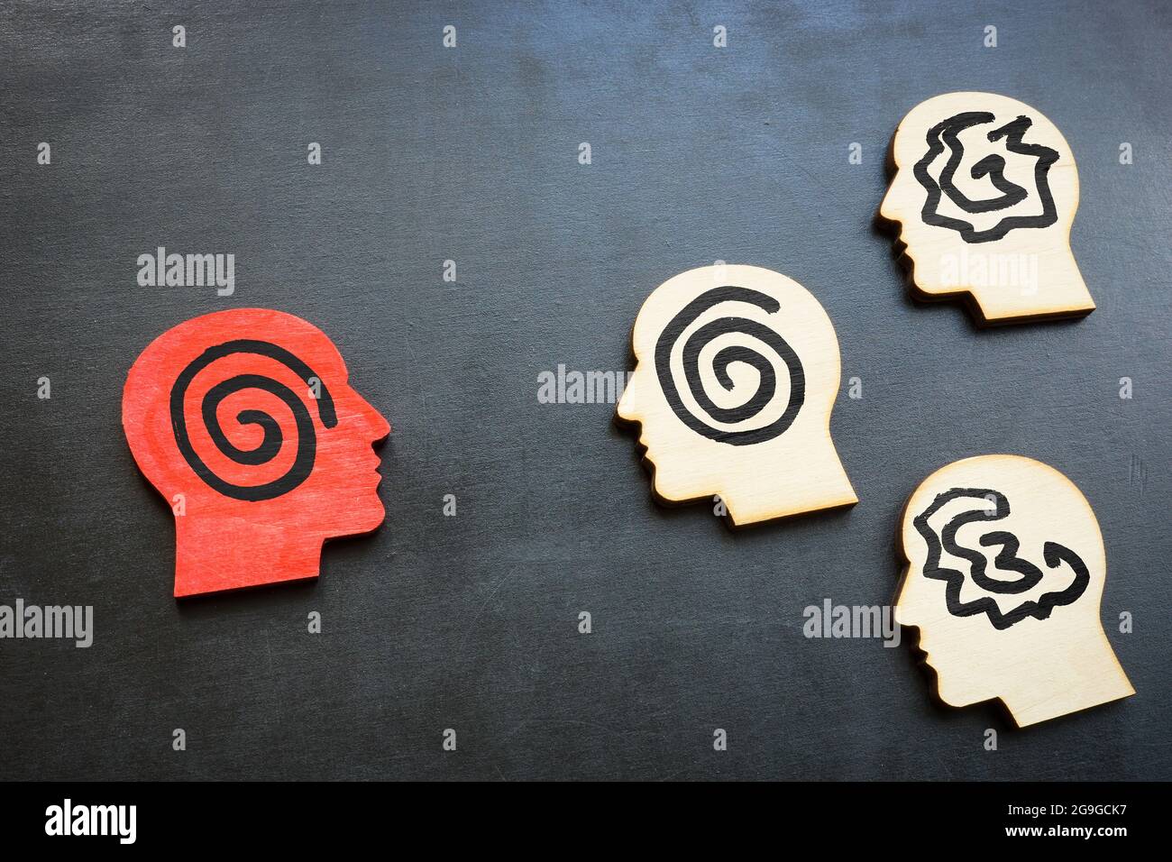 Active listening concept. Head figures on the board Stock Photo - Alamy