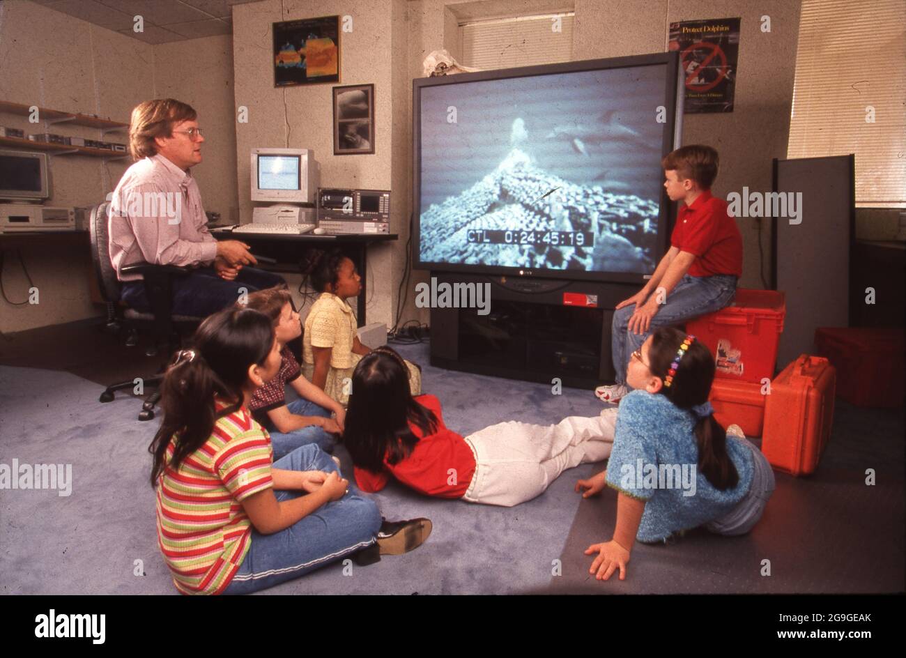 Texas USA, March 1998: Middle school students watch a live feed from an under-sea exploratory craft during a video science class. ©Bob Daemmrich Stock Photo