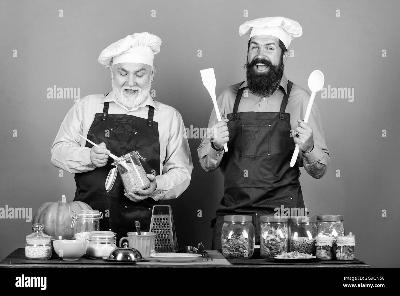 Men Cooking Roles Teaching cooking food. Natural ingredients. Delicious recipe. Chef men ...
