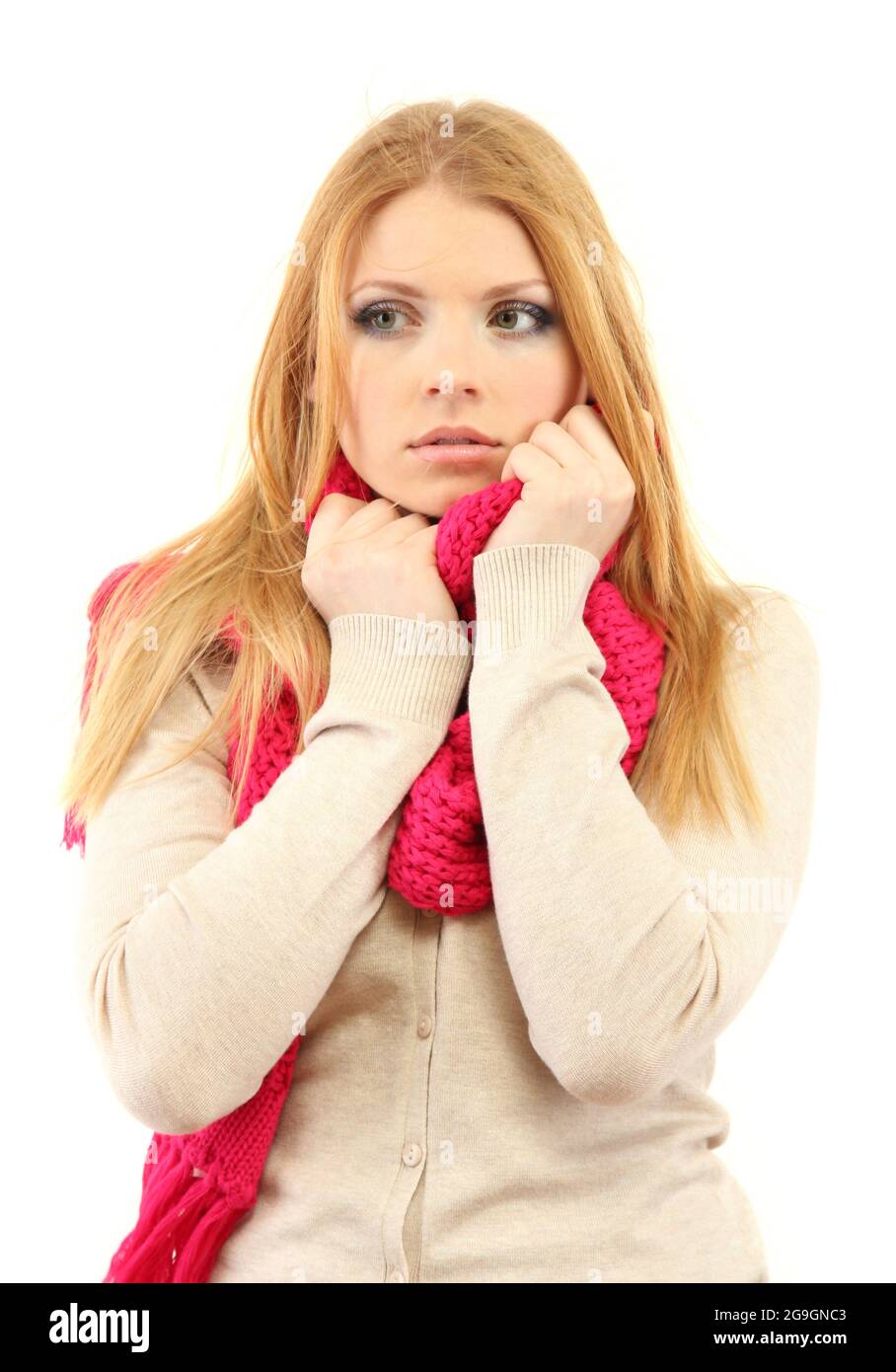 Young beautiful woman wearing winter clothing on cold wind, isolated on