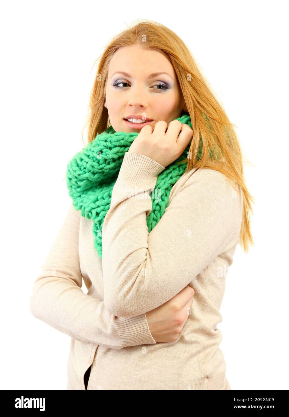 Young beautiful woman wearing winter clothing on cold wind, isolated on