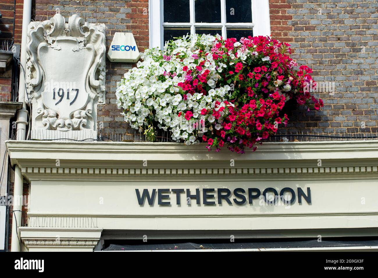 Windsor, Berkshire, UK. 26th July, 2021. The King and Castle Wetherspoon pub in Windsor. Tim Martin of pub chain J D Wetherspoon has reportedly warned that the post Covid-19 recovery is likely to be set of course due to the NHS Covid-19 Test and Trace app pings. Credit: Maureen McLean/Alamy Live News Stock Photo