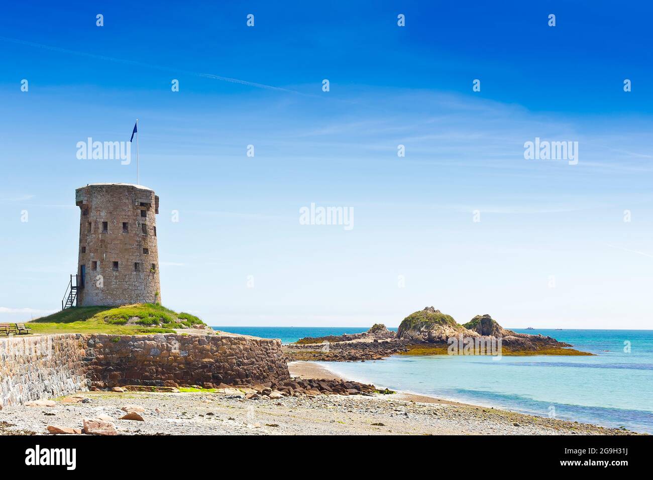 Le Hocq Tower and Common on the south shore of Jersey, Channel Islands,  Britain, on a sunny summer day Stock Photo - Alamy