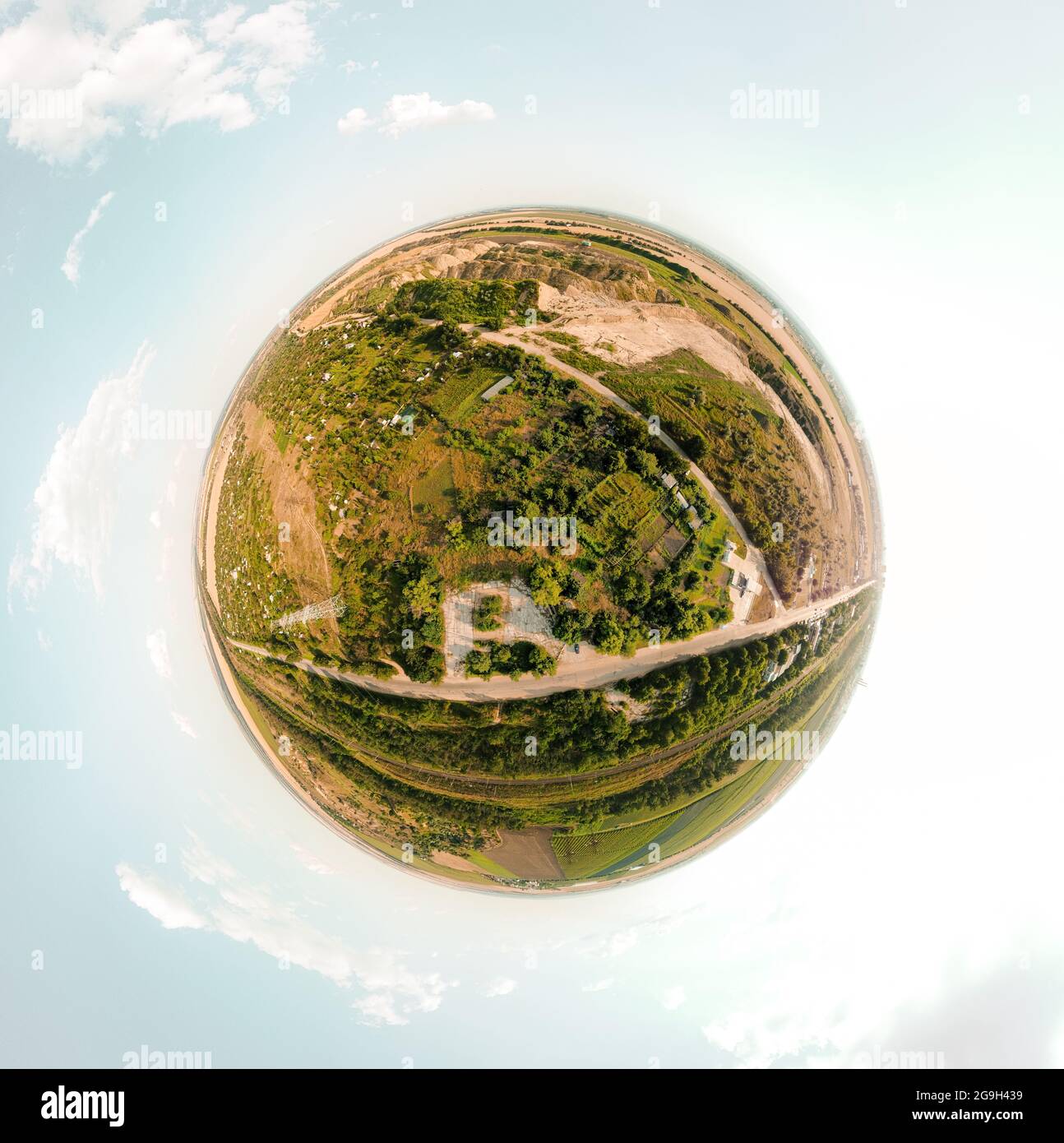Small planet with a view of a sand quarry and a city under the blue sky in  Moldova, spherical panorama on DJi Mavic Mini 2 Stock Photo - Alamy