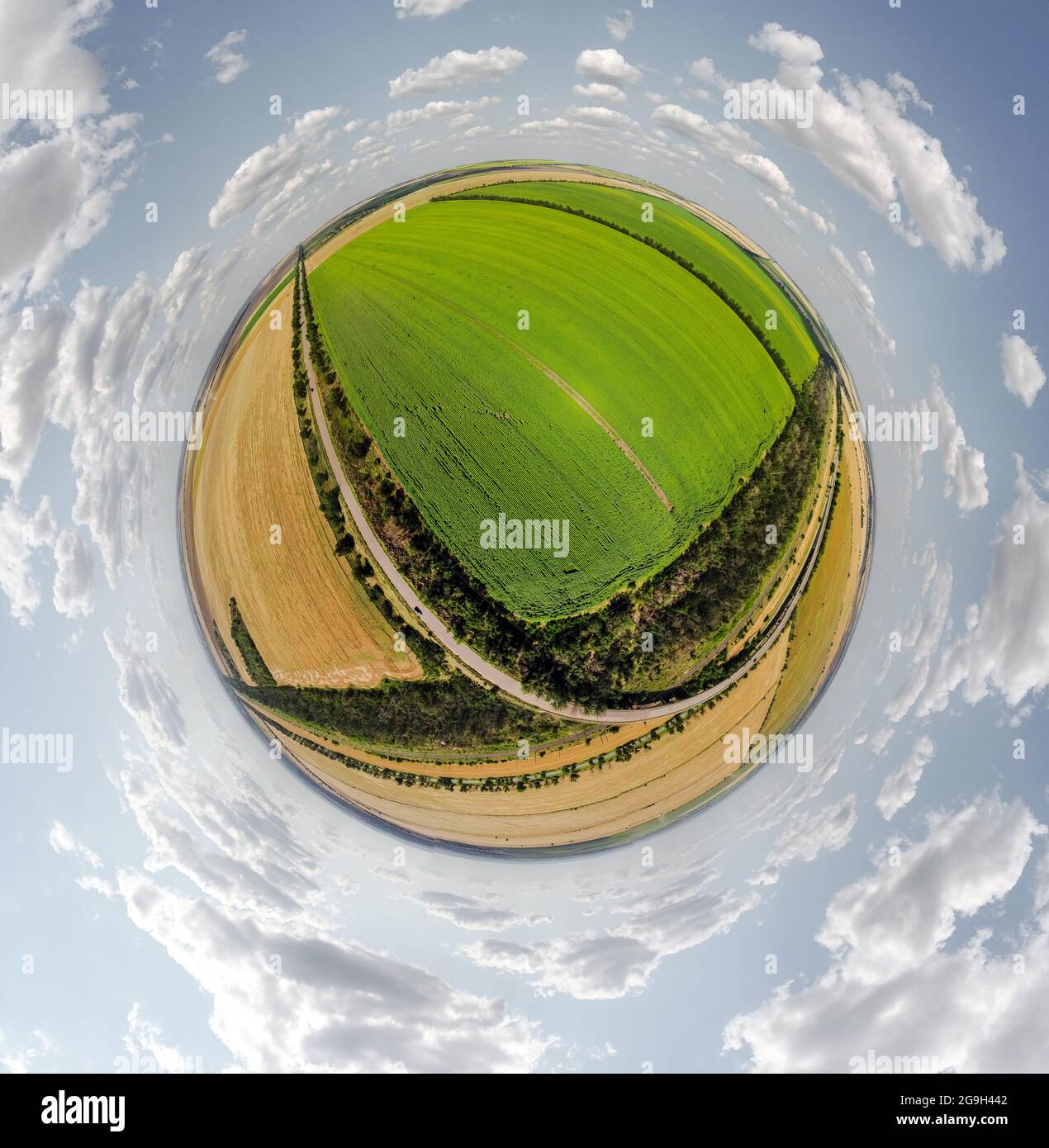 Small planet with a view of a bridge, wheat and corn fields under the blue  sky in Moldova, spherical panorama on DJi Mavic Mini 2 Stock Photo - Alamy