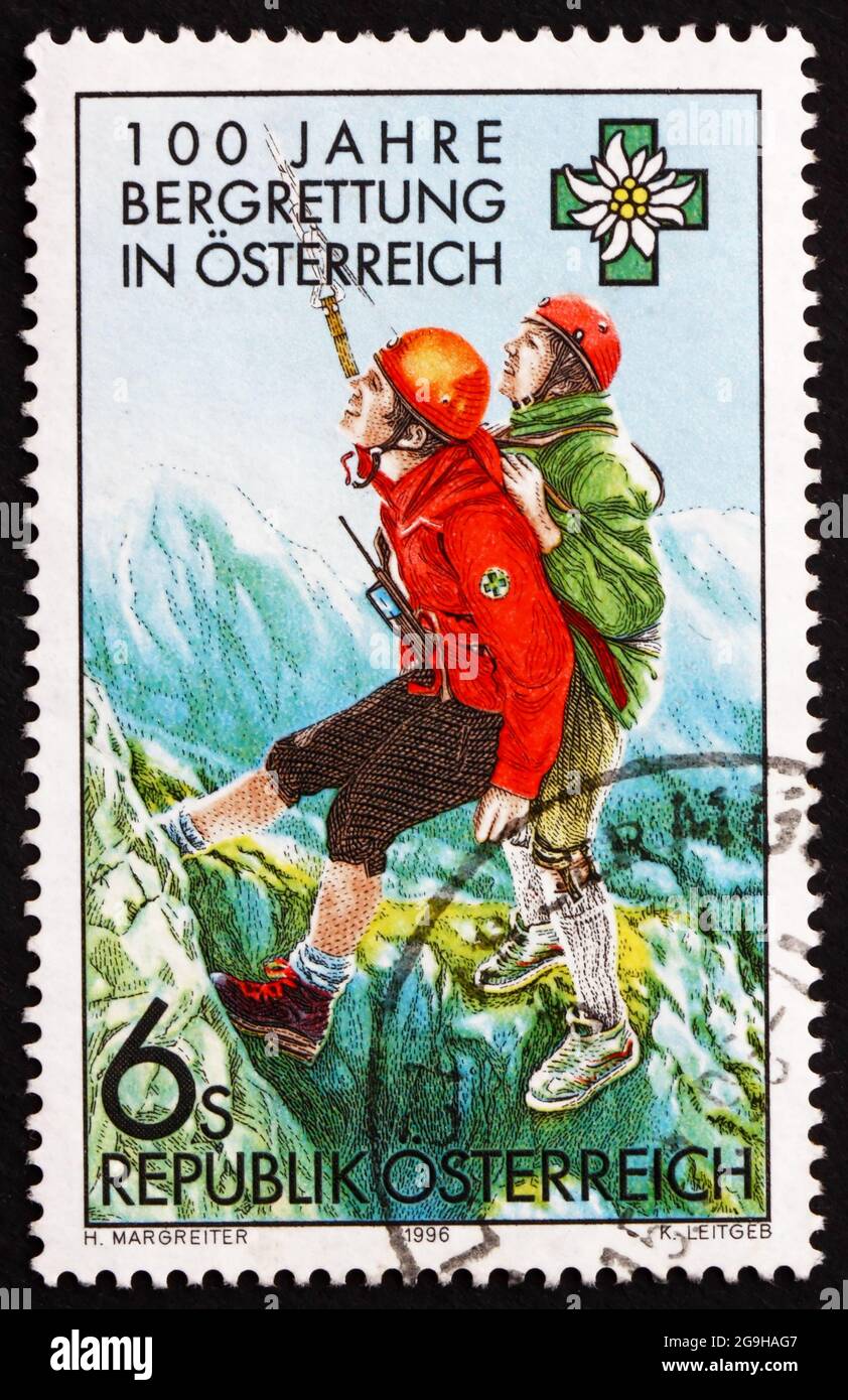 AUSTRIA - CIRCA 1996: a stamp printed in the Austria shows Austrian Mountain Rescue Service, Centenary, circa 1996 Stock Photo