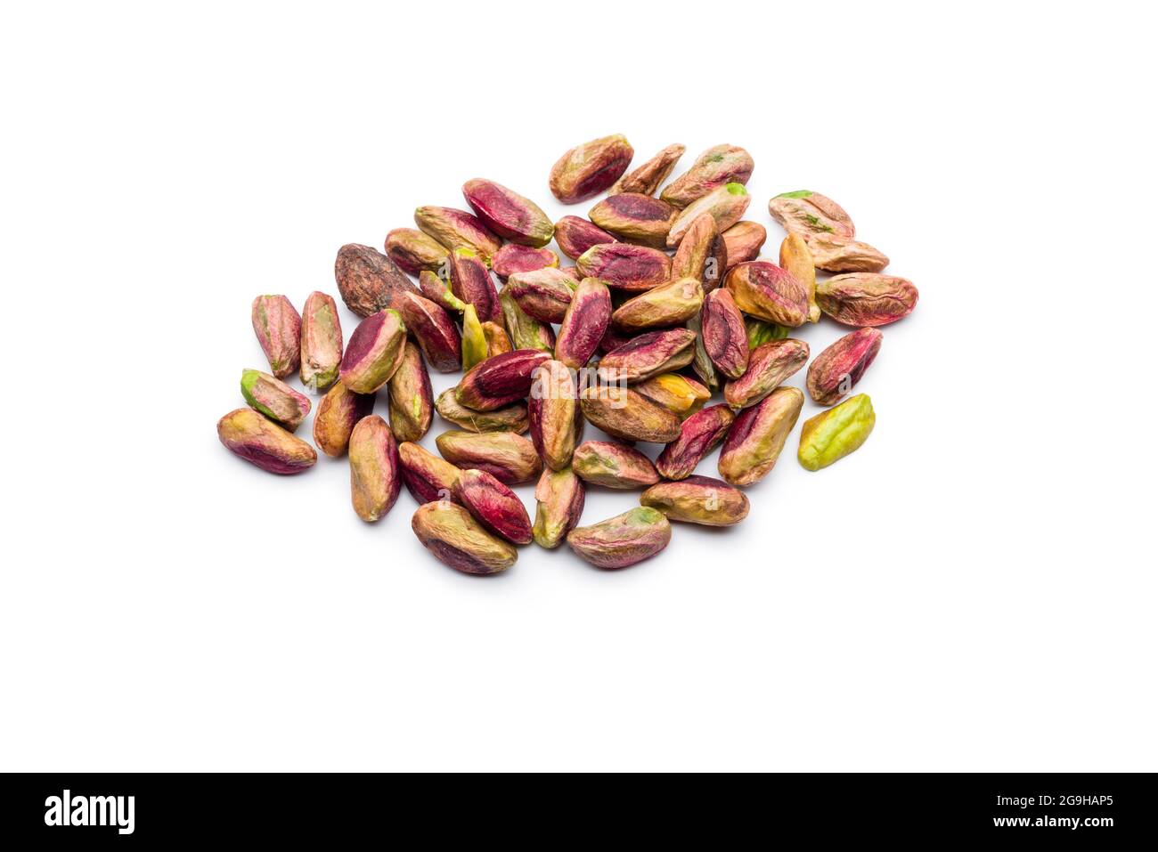 Peeled pistachios bunch on white background Stock Photo