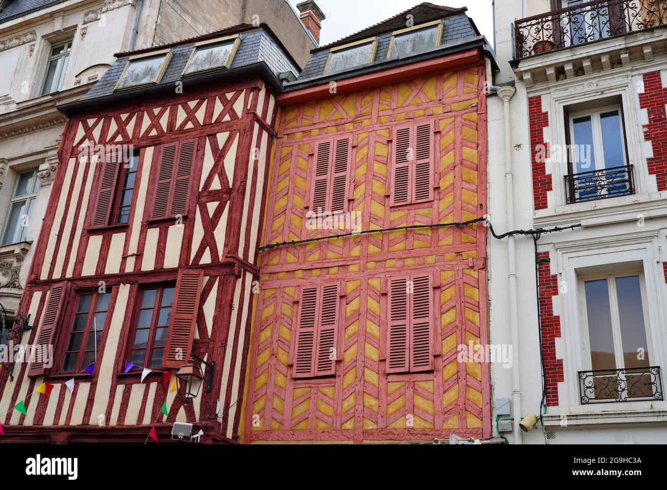 AUXERRE, FRANCE -28 JUN 2021- View of colorful medieval Tudor style maison a colombage with wooden beams in Auxerre, capital of the Yonne department i Stock Photo