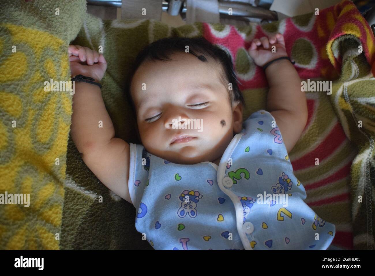 Indian girl sleeping in bed hi-res stock photography and images - Alamy