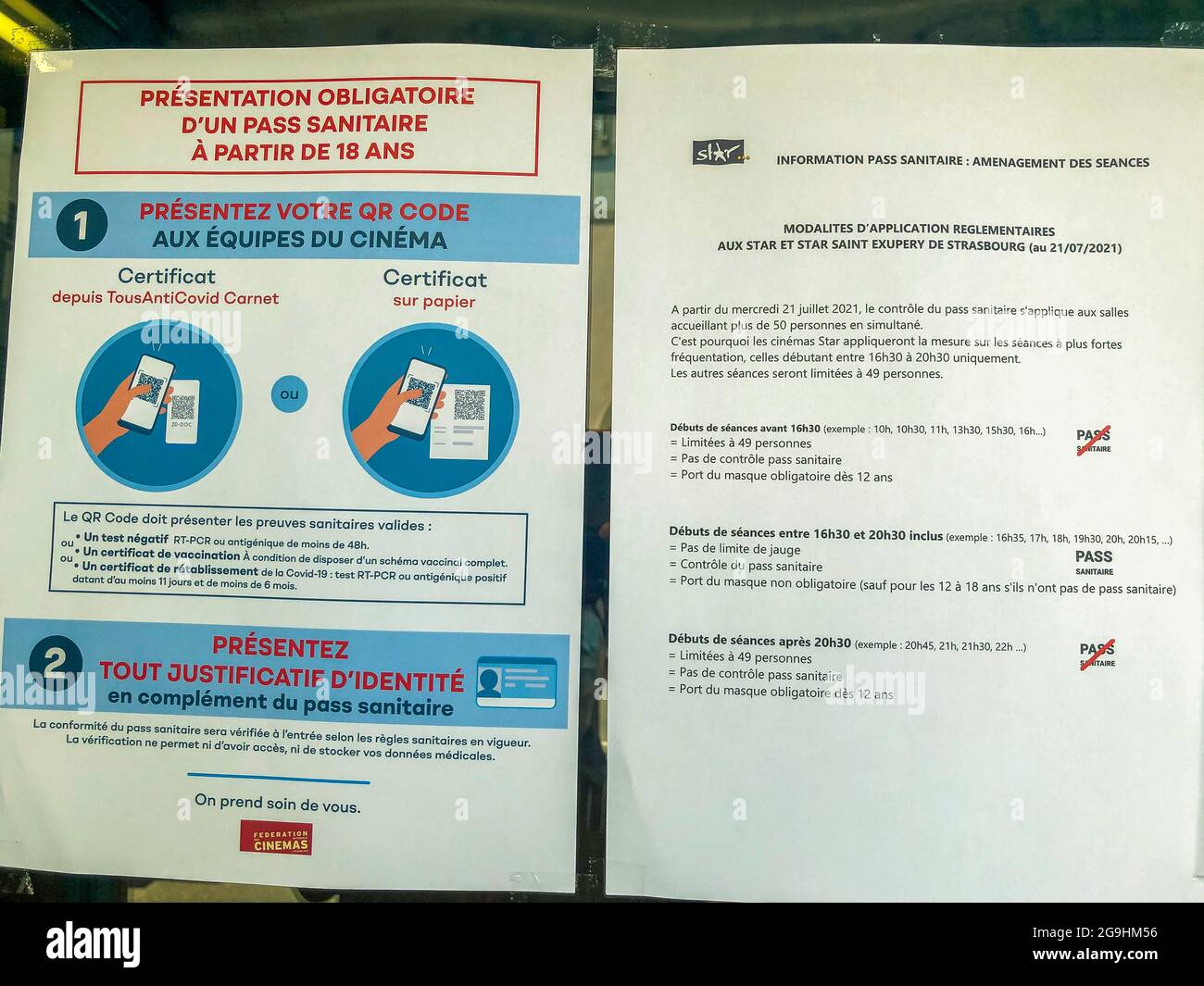 Strasbourg, France, Poster in Window of French Cinema (Star Saint-Exupery), Covid-19 health pass requirements, Virus Pass Rules Stock Photo
