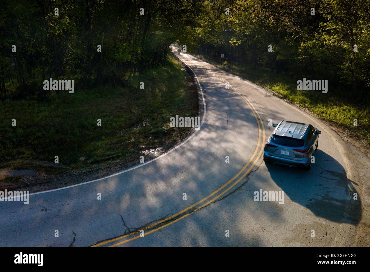 Meramec Bottom Road passes through woods near Route 21 along the