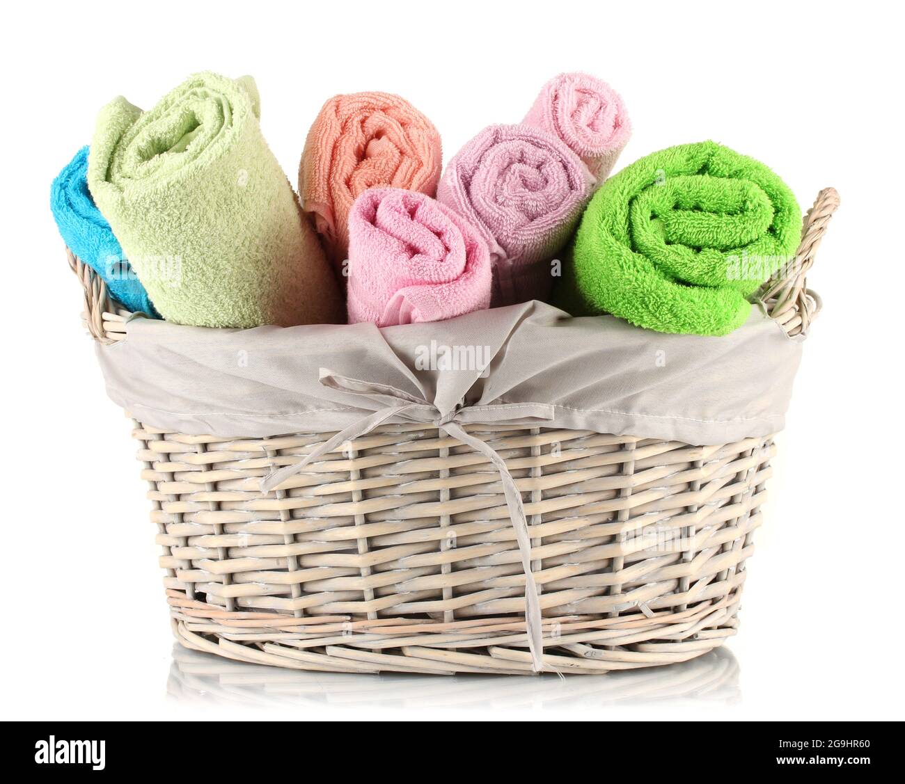 Colorful towels in basket isolated on white Stock Photo Alamy