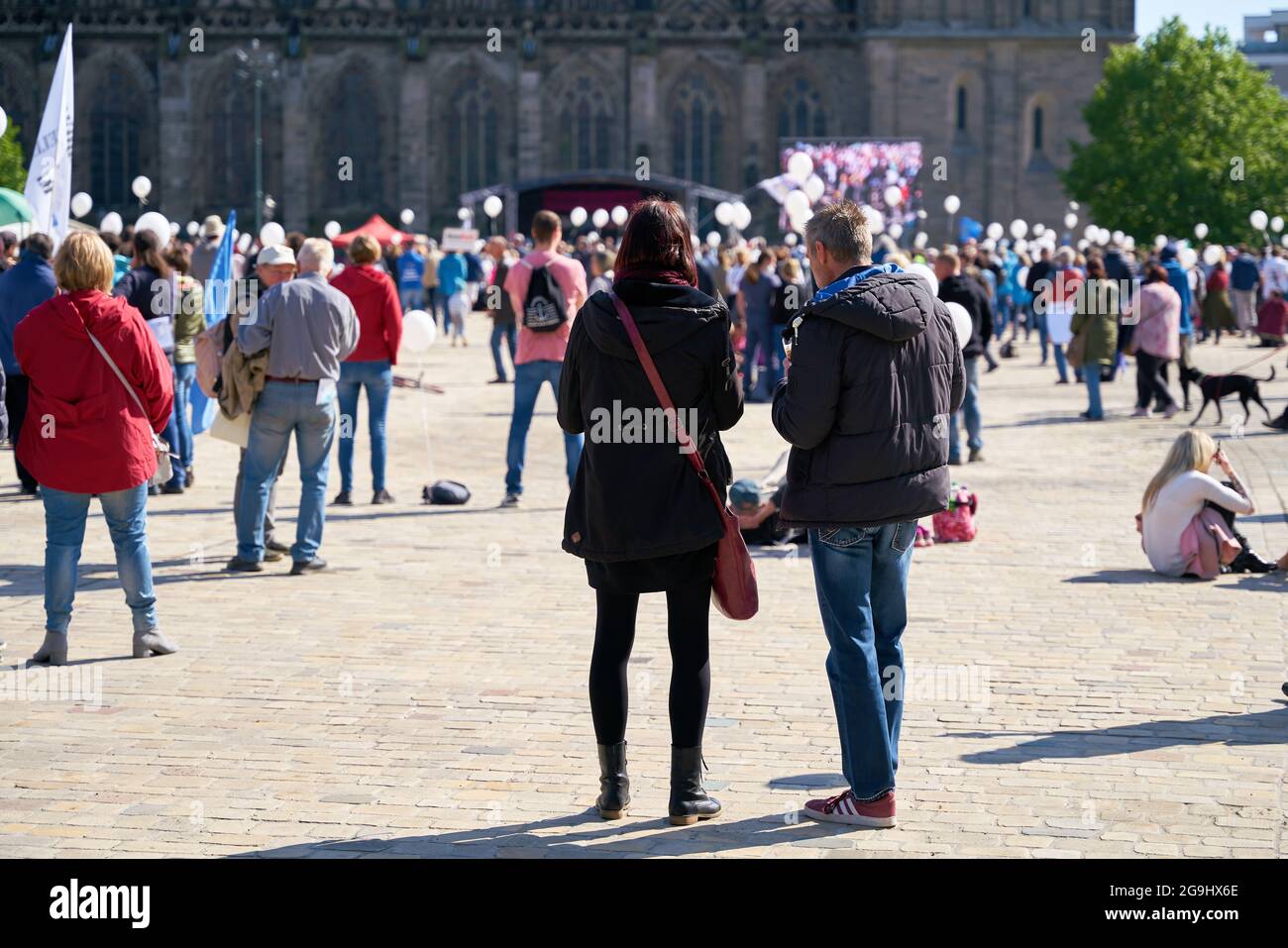 Protest event during the Corona pandemic on the cathedral square in Magdeburg in Germany Stock Photo