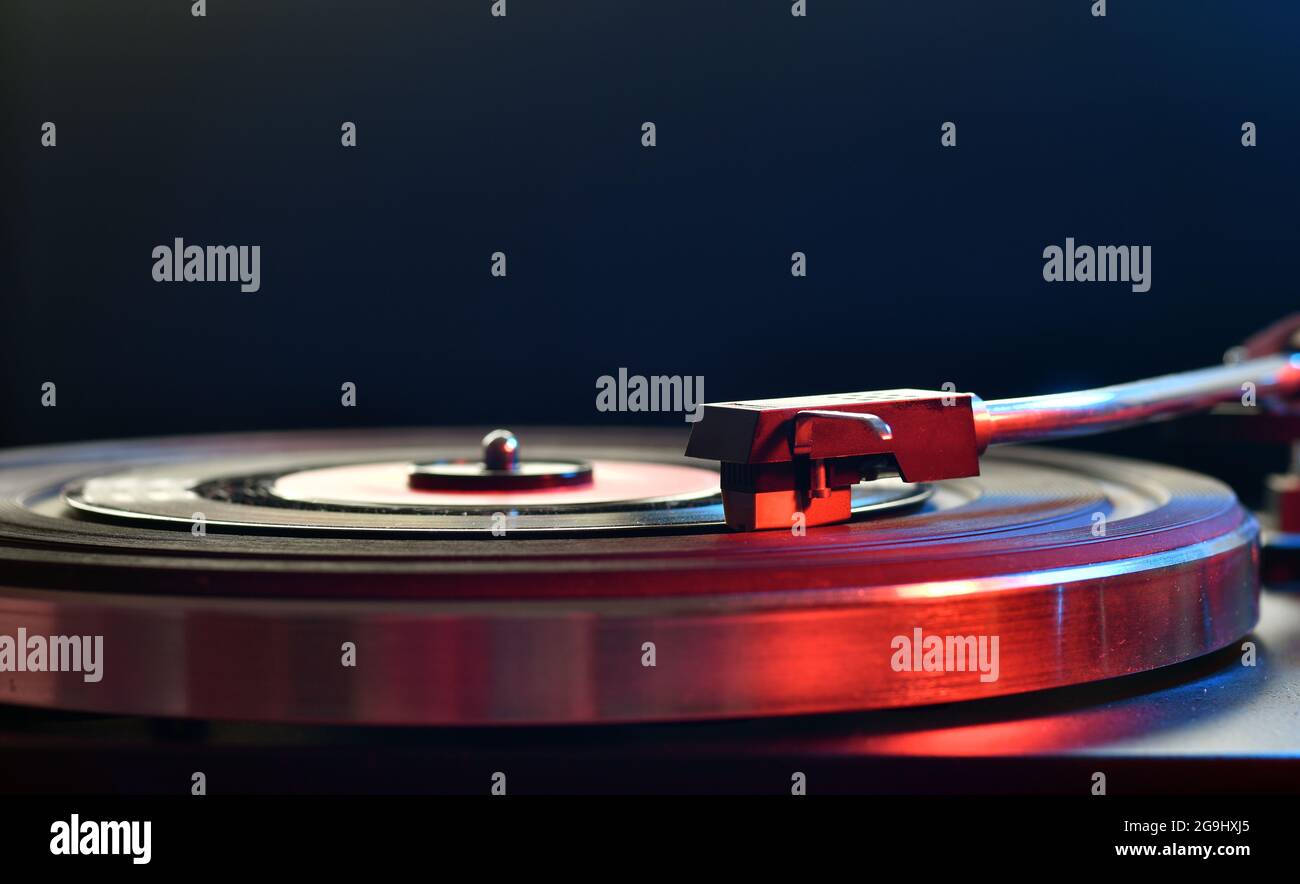 Close up of turntable neede on a vinyl record. Turntable playing vinyl record Stock Photo