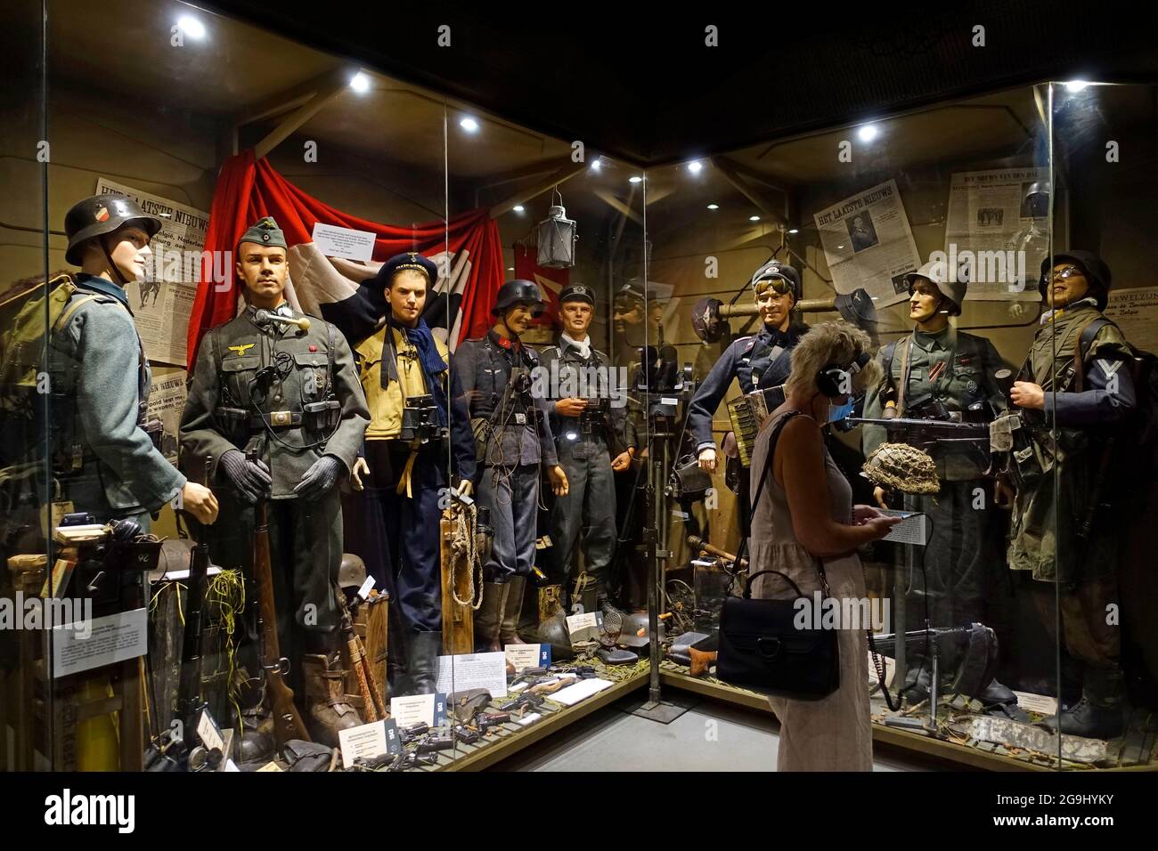 German World War Two military uniforms on display at the For Freedom Museum about WWII at Ramskapelle, Knokke-Heist, West Flanders, Belgium Stock Photo