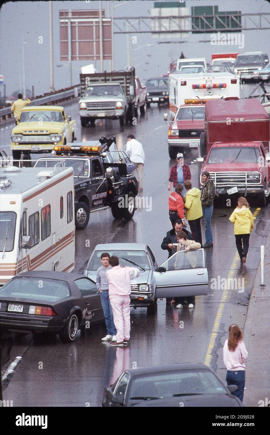 Austin Texas USA, 1989: Traffic accident on a rain-slicked Interstate Highway 35 near downtown, no injuries. ©Bob Daemmrich Stock Photo