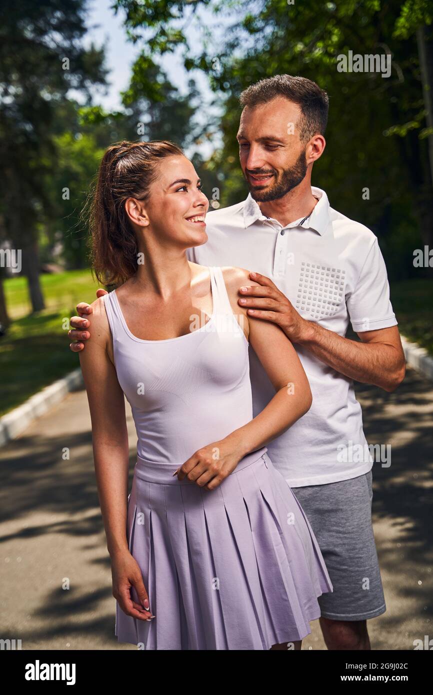 Happy young woman smiling at her boyfriend Stock Photo