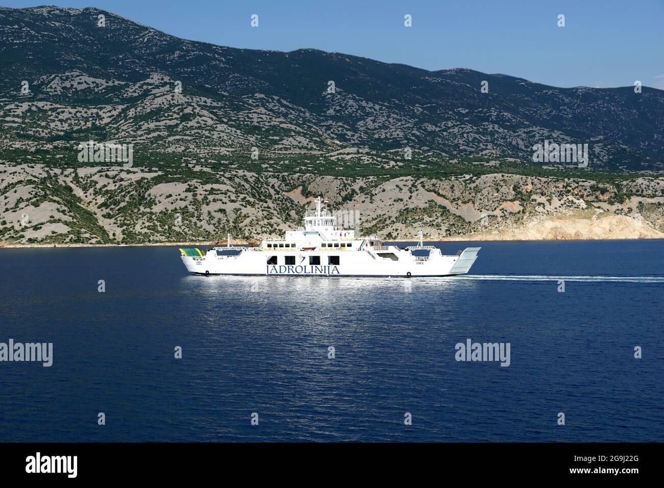 Prizna, Croatia, 18th Jun, 2021. The ferry of the national Croatian shipping company Jadrolinija sails between the mainland and the island of Pag Stock Photo