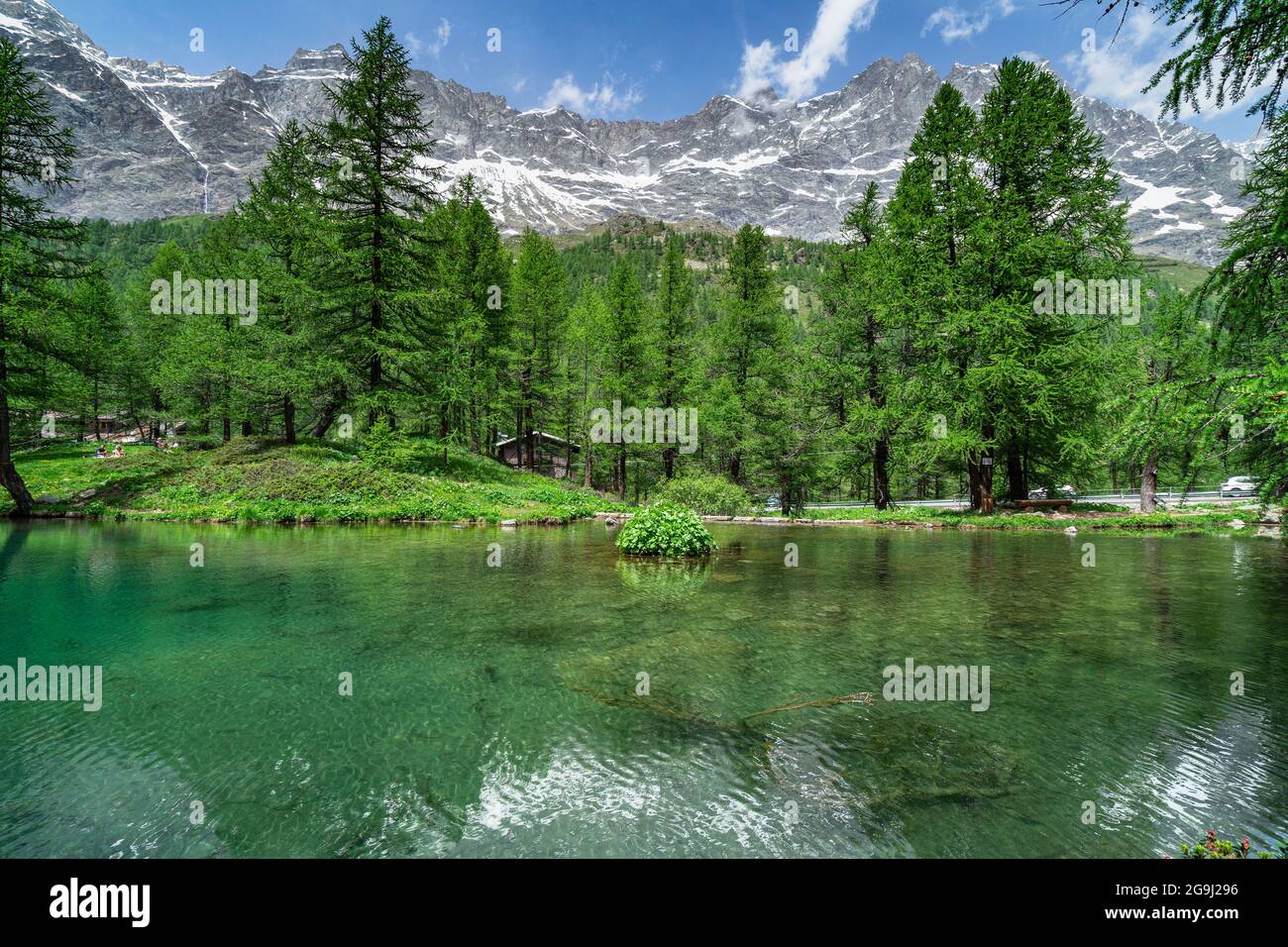 The scenic Blue Lake (Lago Blu) surrounded by a beautiful alpine landscape near Cervinia, Aosta Valley, Italy Stock Photo