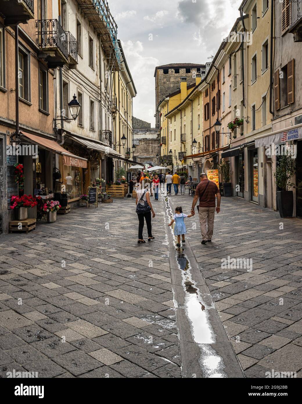 Aosta, Italy, June 2021 - View of the main pedestrian street of Aosta historic center, full of shops and restaurants Stock Photo