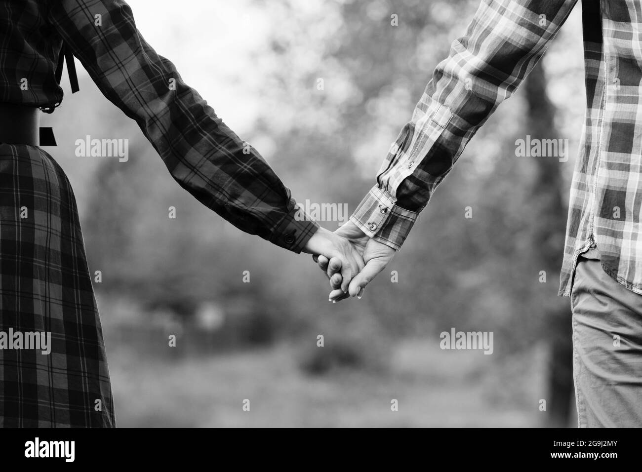 Black And White Photography Of Couples Holding Hands