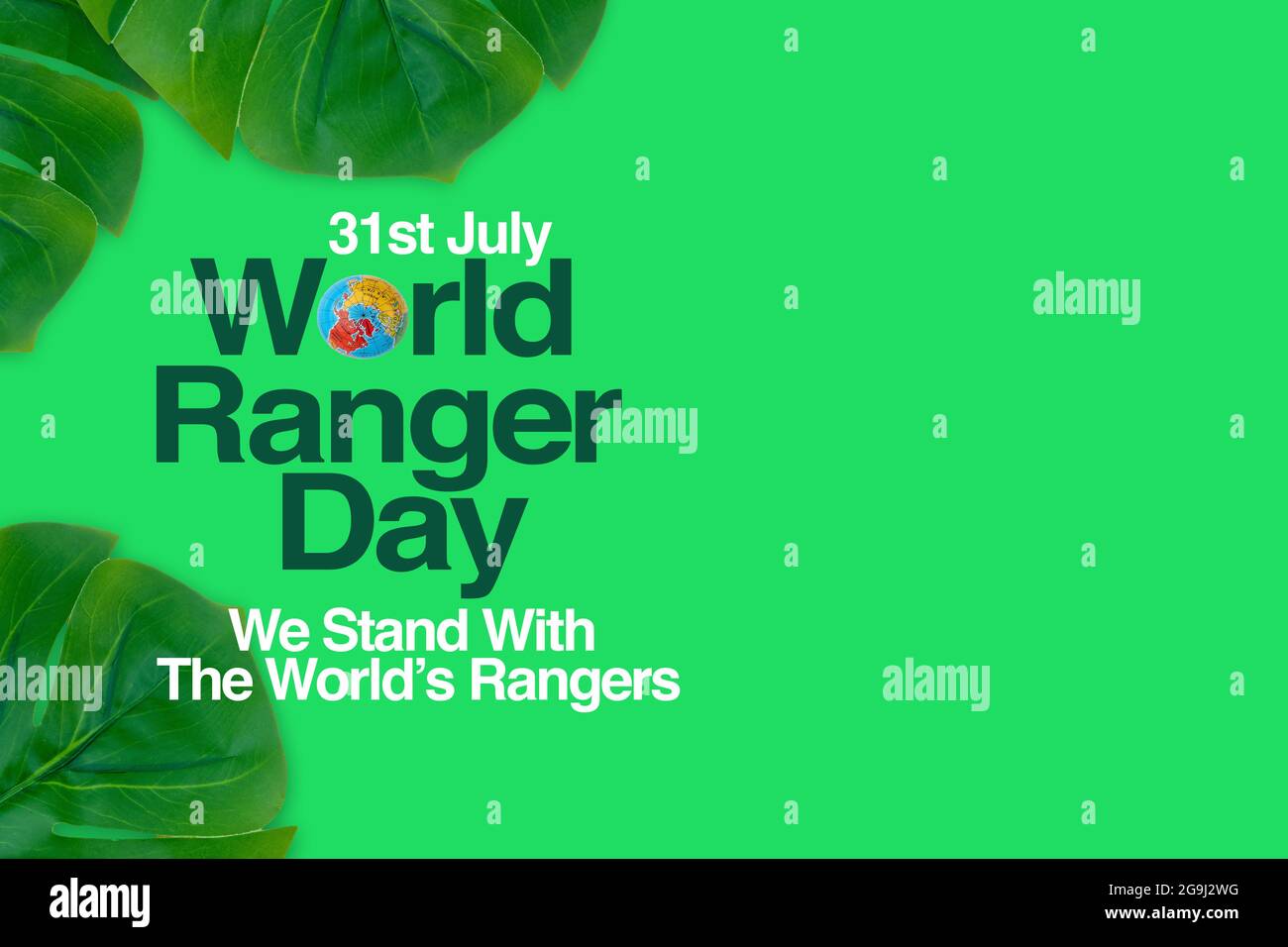 WORLD RANGER DAY text and leaves on green background. WORLD RANGER DAY