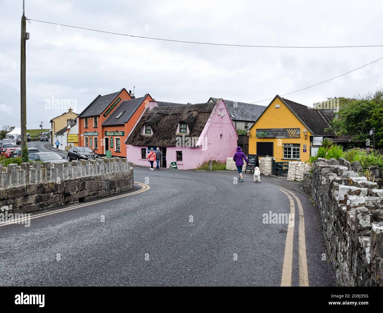 Doolin, Ireland July 4, 2021 Tourists walking through the village of