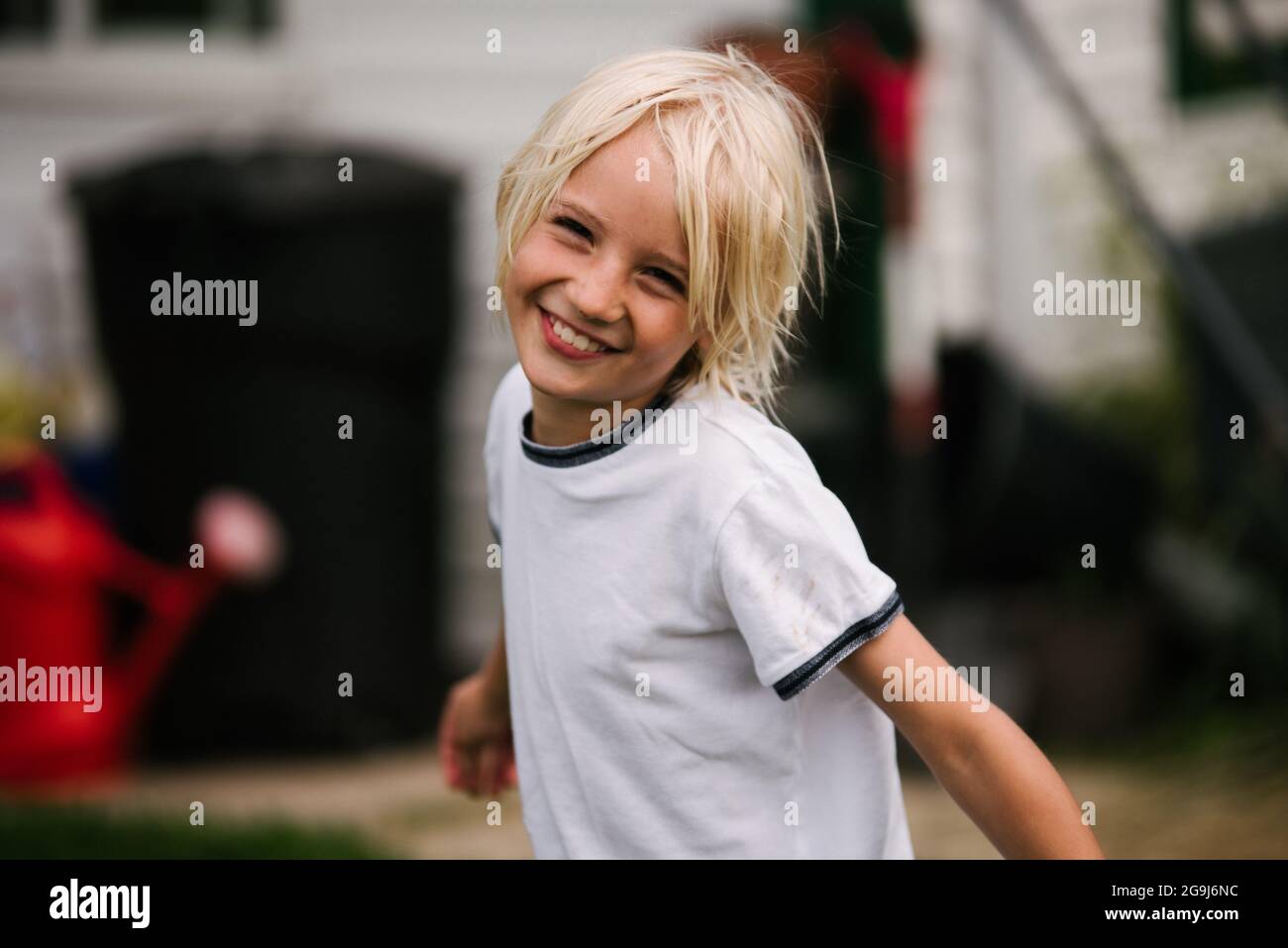Canada, Ontario, Kingston, Portrait of smiling blonde boy (8-9) Stock Photo