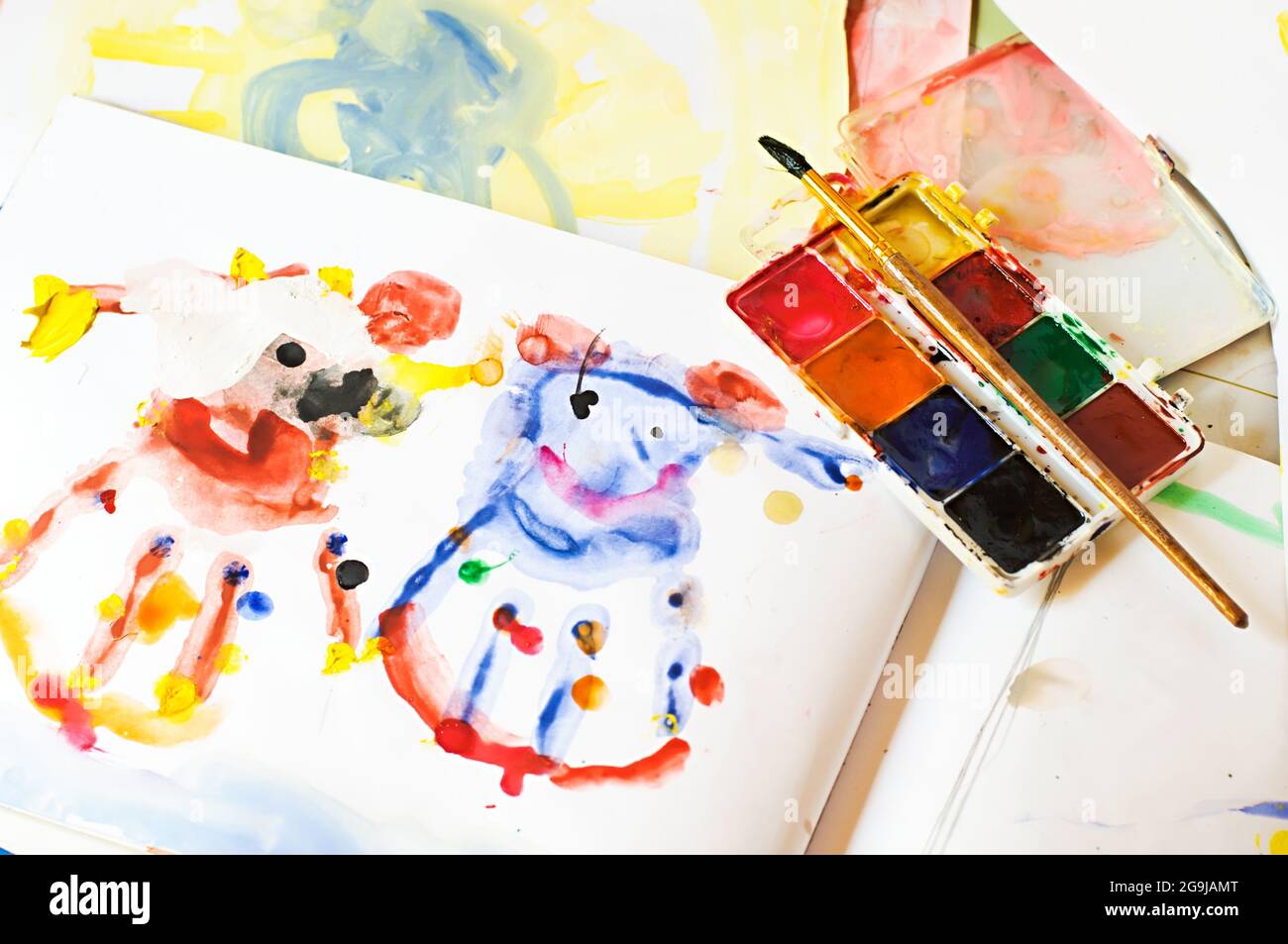 Brush, paint and children's drawing Stock Photo
