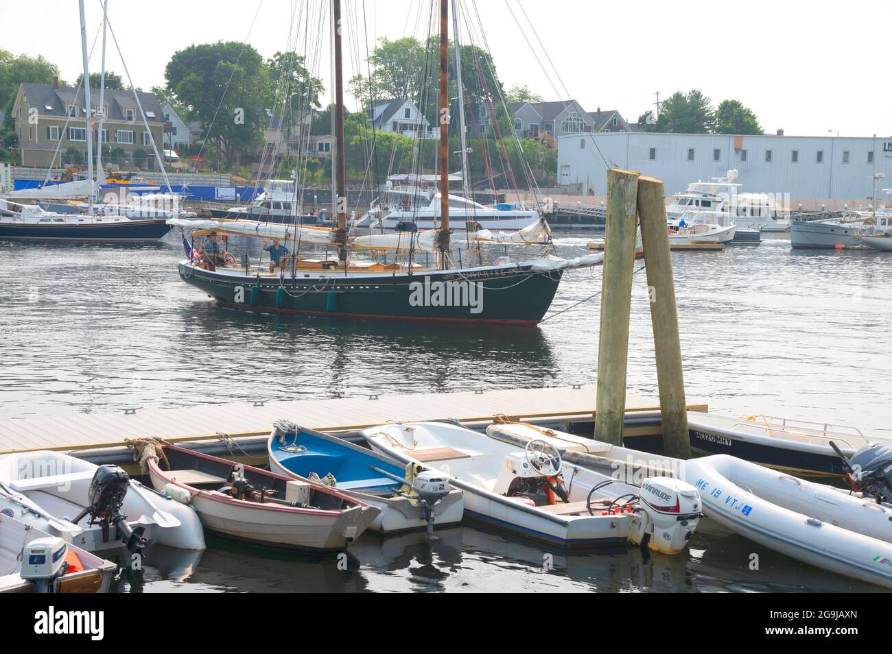 A sailing vessel leaving the dock in Camden, Maine, USA Stock Photo Alamy