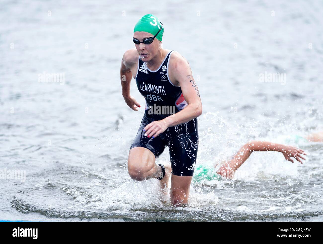 Great Britain's Jessica Learmonth exits the water during the Women's Triathlon at the Odaiba Marine Park on the fourth day of the Tokyo 2020 Olympic Games in Japan. Picture date: Tuesday July 27, 2021. Stock Photo