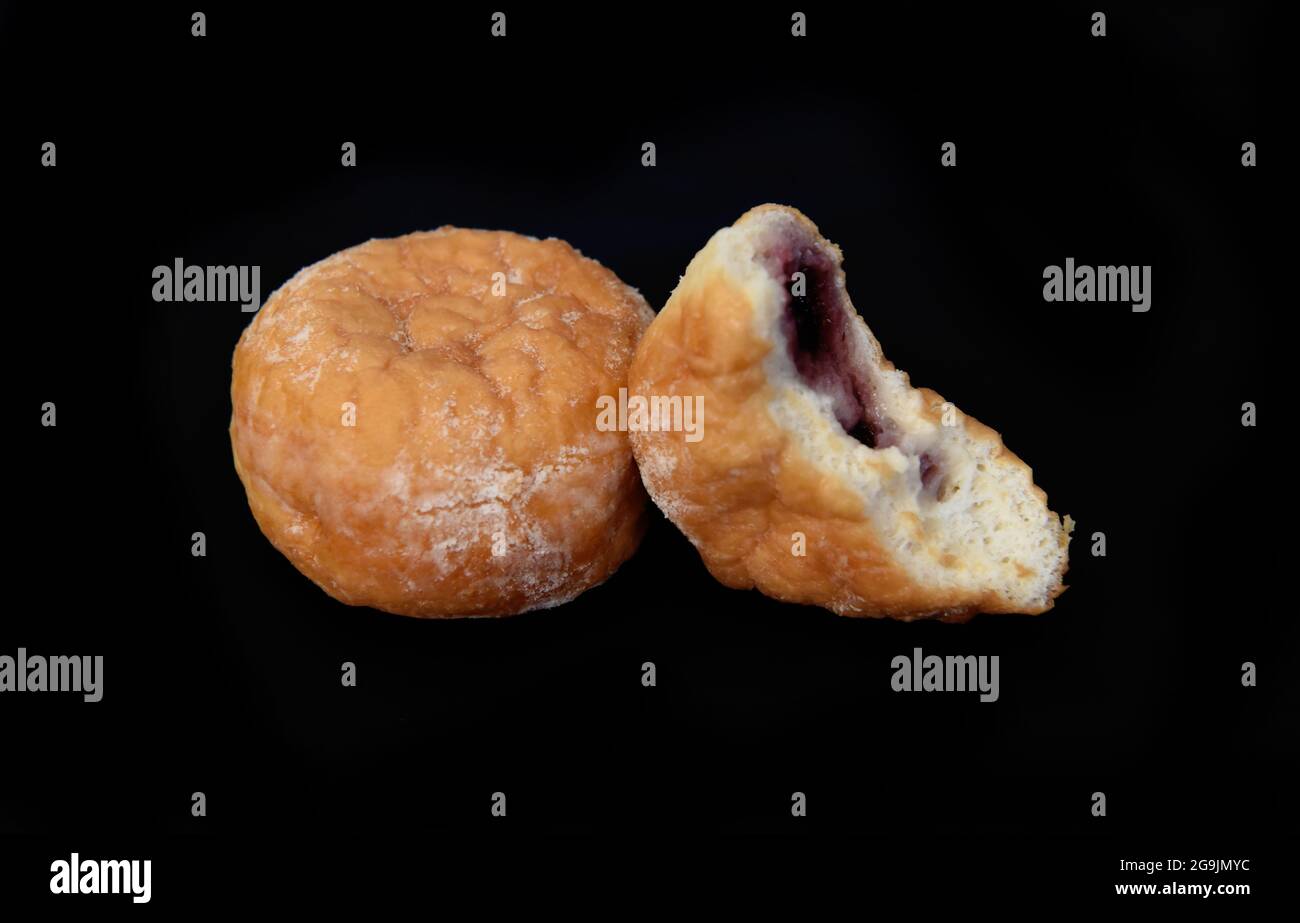 Vegan Jam Doughnuts on Black Background Stock Photo