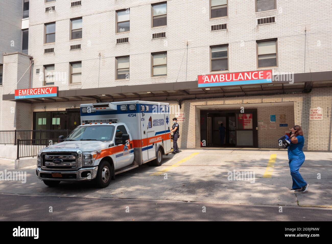emergency entrance to Long Island Jewish Forest Hills Hospital on 66th avenue in Forest Hills Queens, New York, with parked ambulance Stock Photo