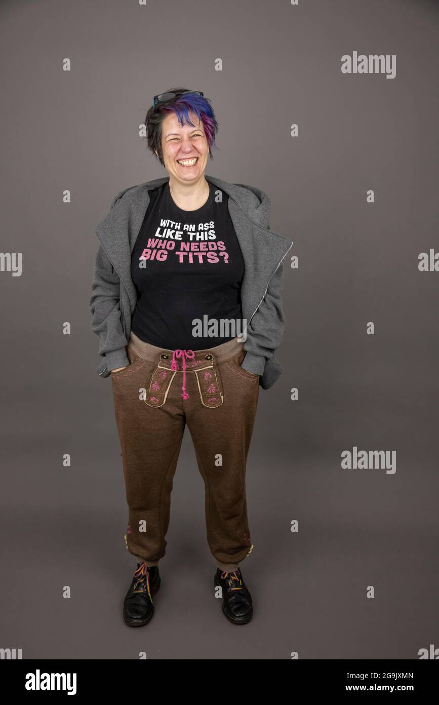 Woman with funny, sexist slogan on her t-shirt, studio shot, Germany Stock Photo